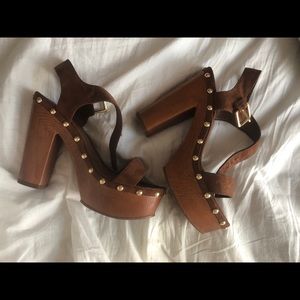 Wooden studded sandals